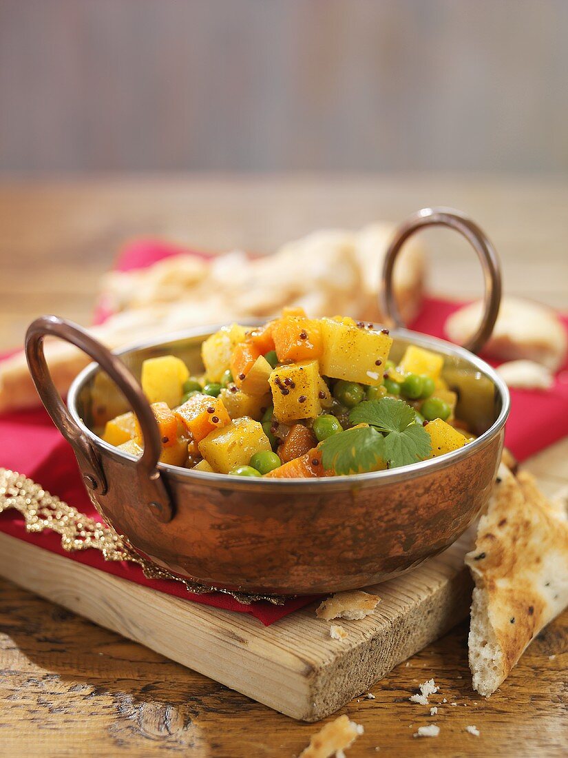 Aloo Mutter (Indian vegetable curry) with flatbread