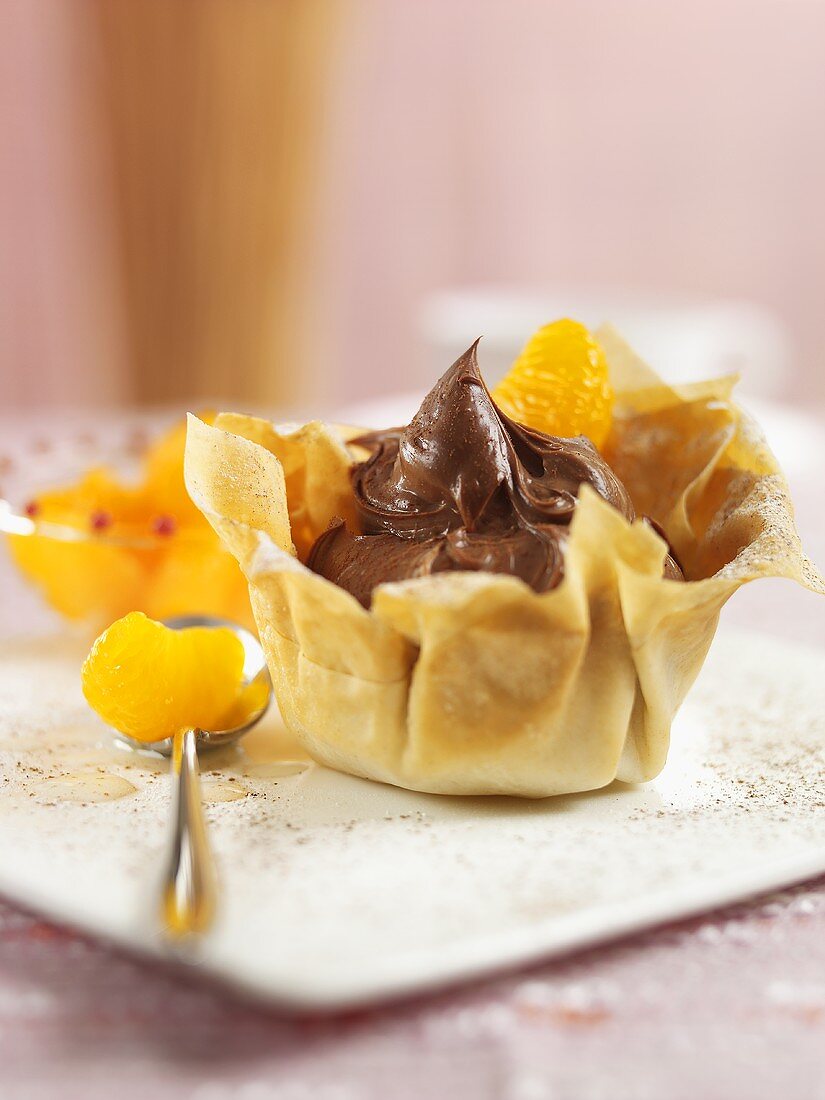 Mandarin oranges and chocolate cream in filo pastry shell