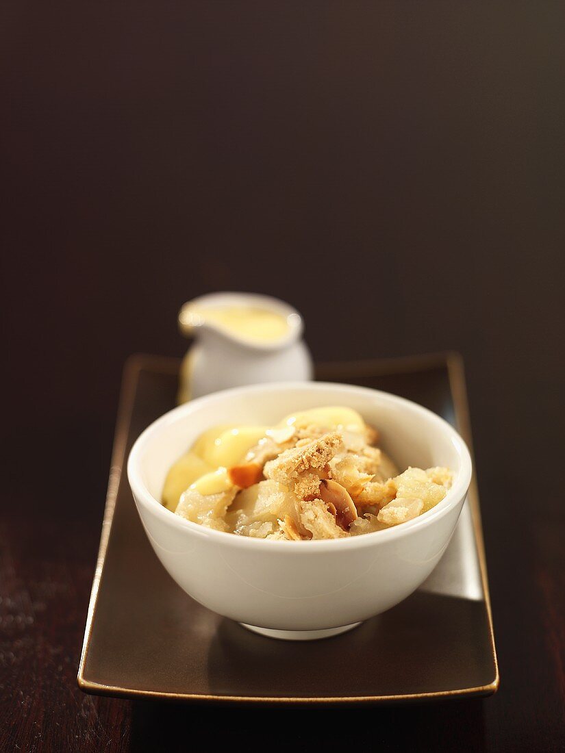 Apple and almond crumble with custard