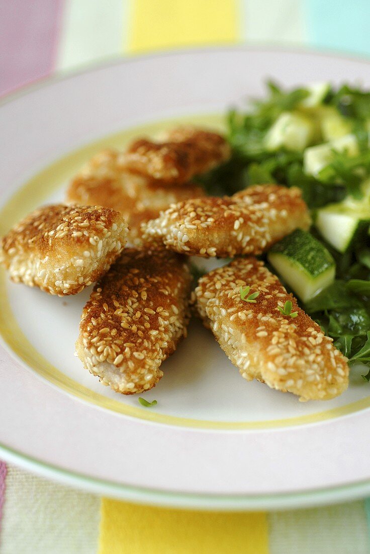Sesame nuggets with courgettes