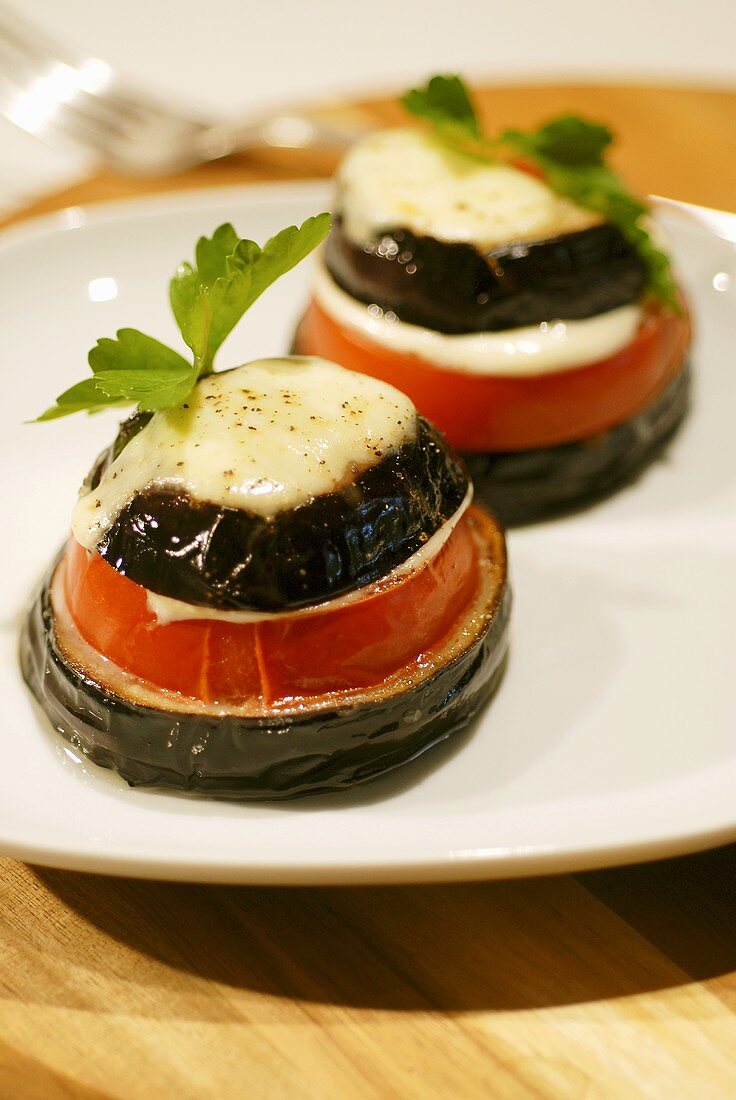 Baked aubergine, tomato and cheese towers