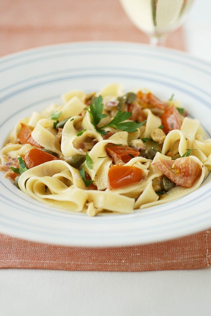 Ribbon pasta with tomatoes and capers