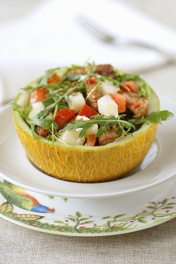 Savoury melon salad in hollowed-out melon