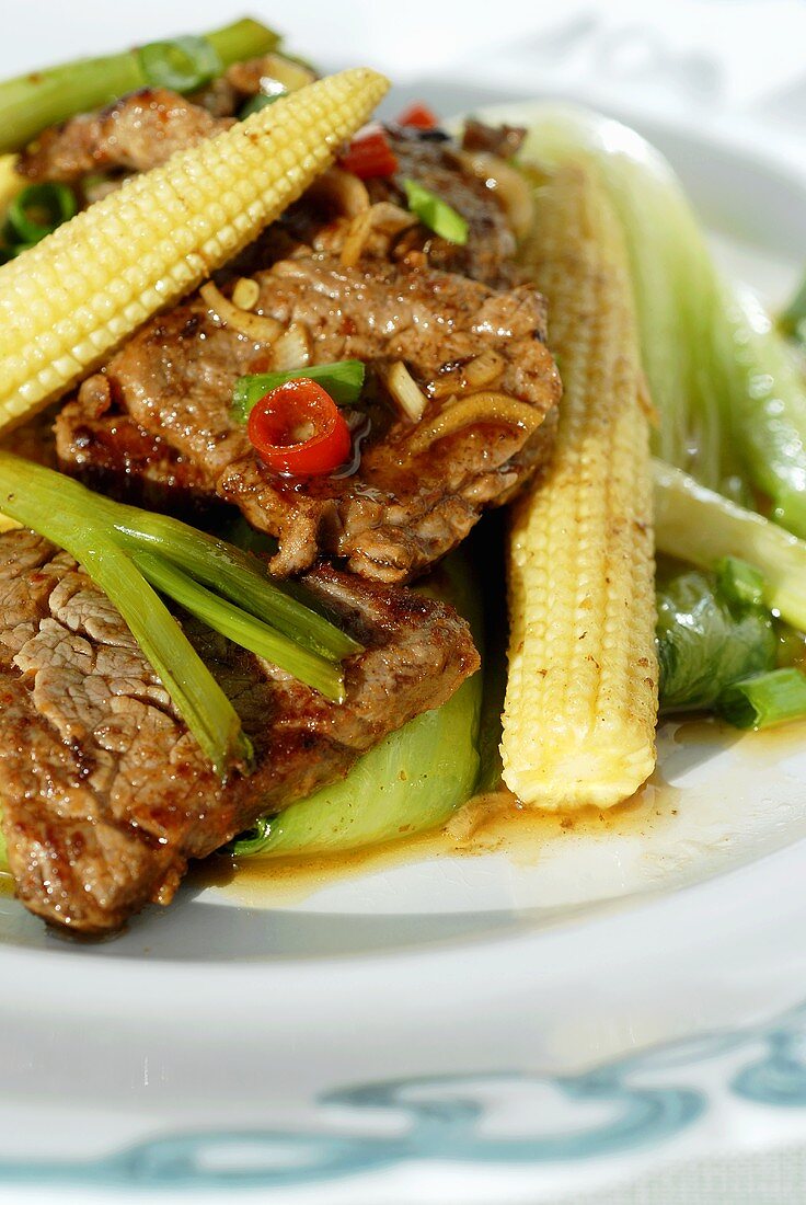 Beef with chard and baby corncobs