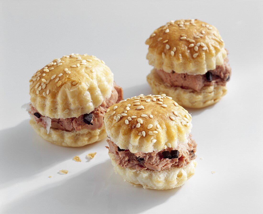 Sesame puff pastries filled with truffle liver sausage