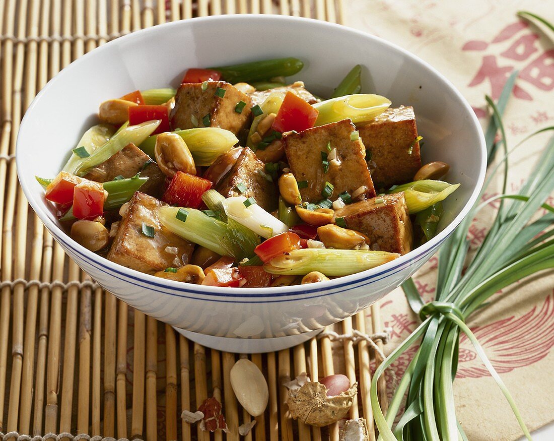 Fried tofu with peanuts and vegetables