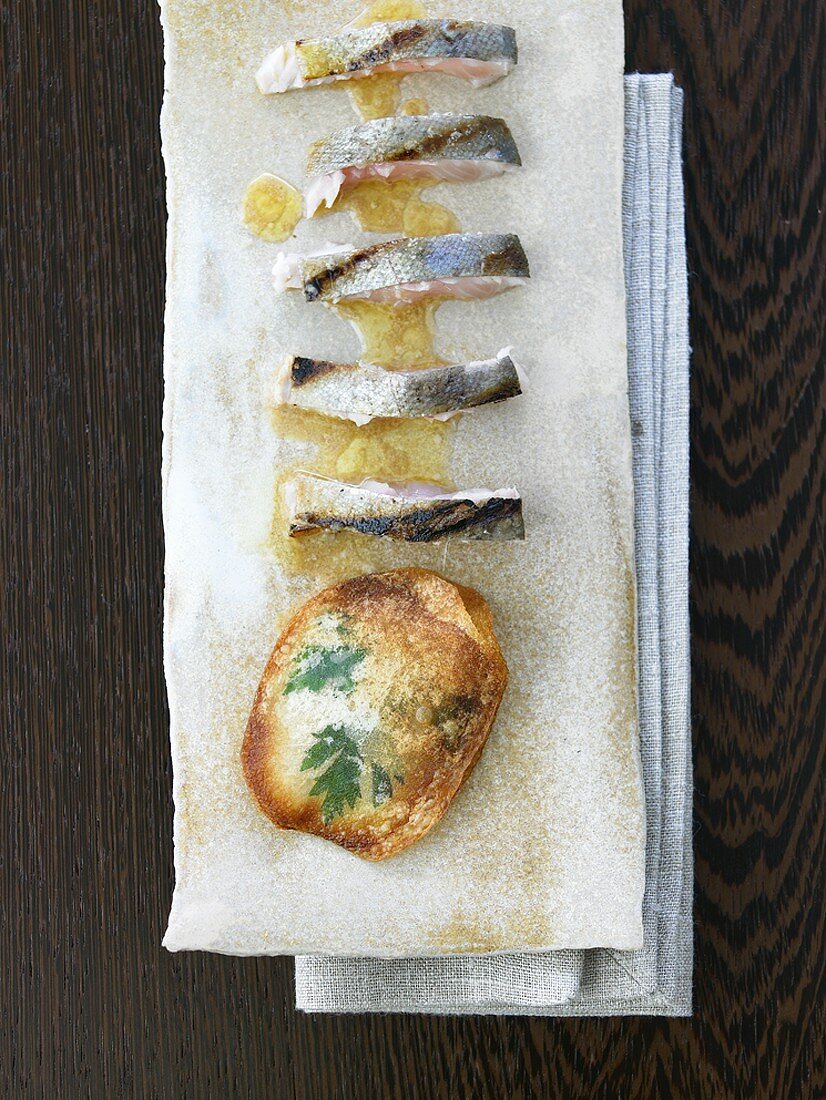 Fried trout sashimi with potato crisps