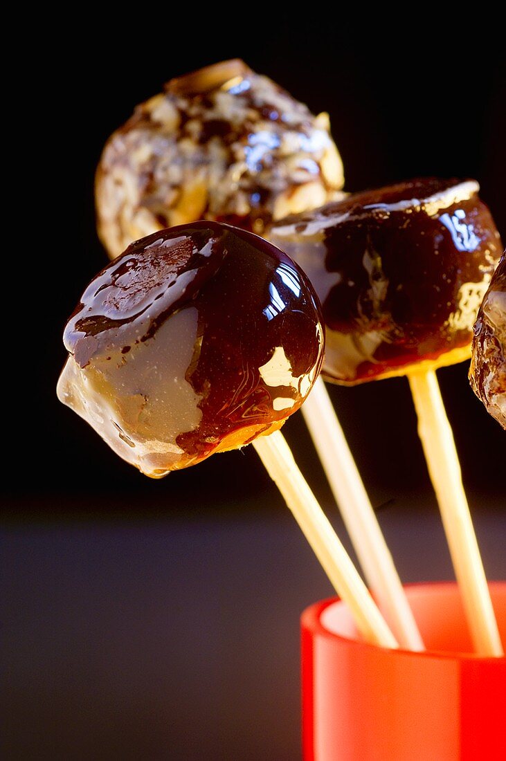 Toffee apples on sticks