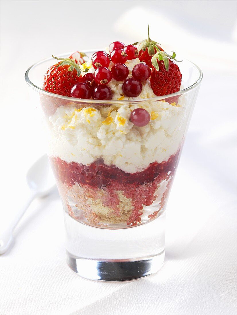 Layered dessert of soft cheese and berries
