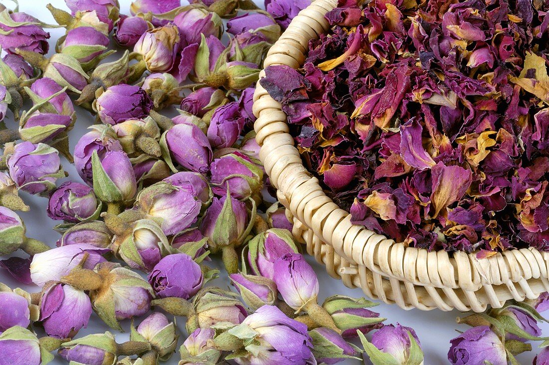 Dried rosebuds and petals in basket