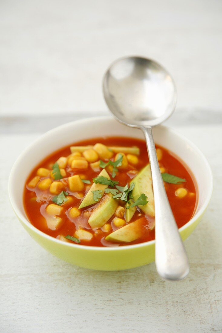 Sweetcorn and tomato soup with avocado