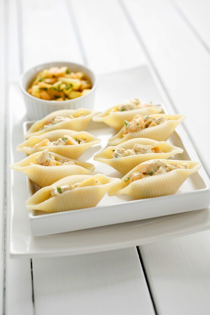 Filled pasta shells with melon and mango