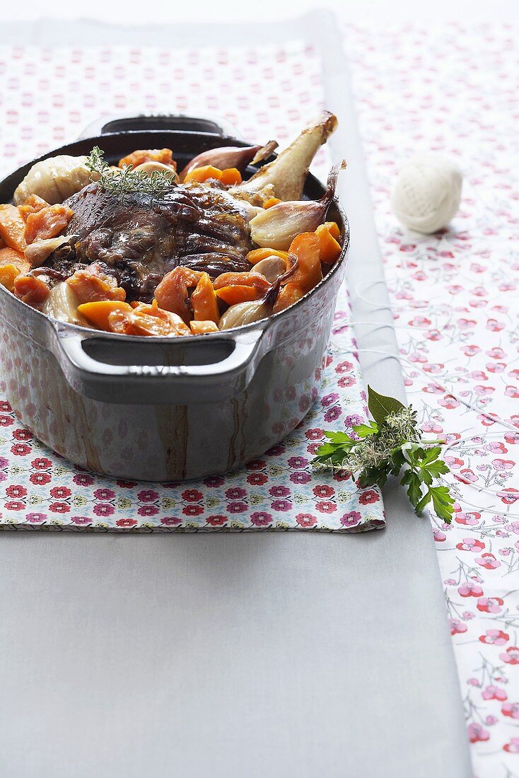 Oven-braised leg of lamb with vegetables