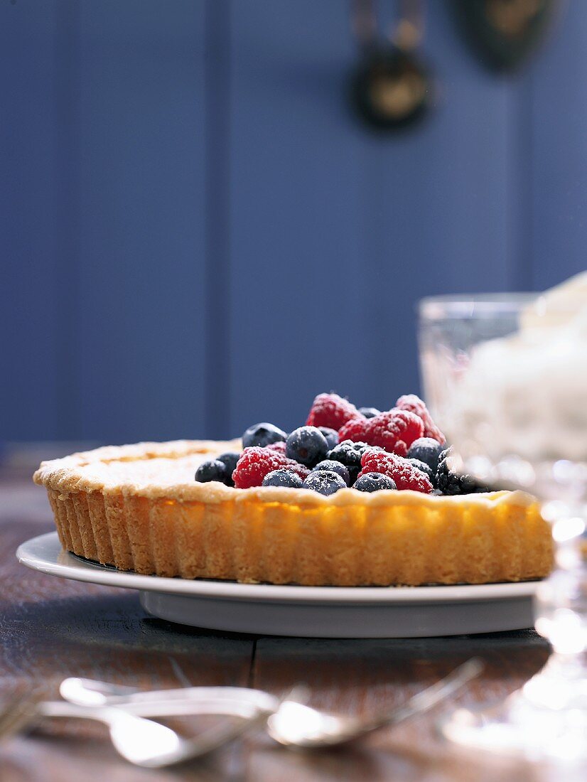 A lemon tart with berries