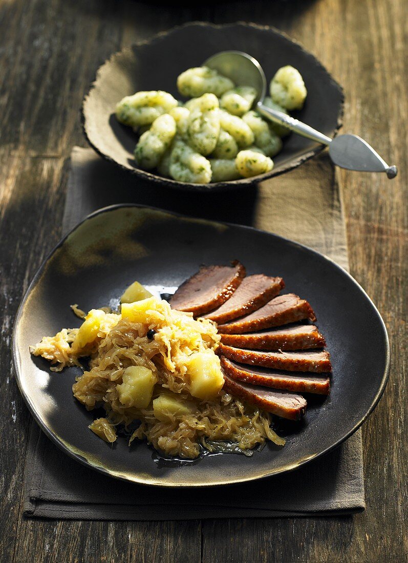 Duck with sauerkraut and herb gnocchi