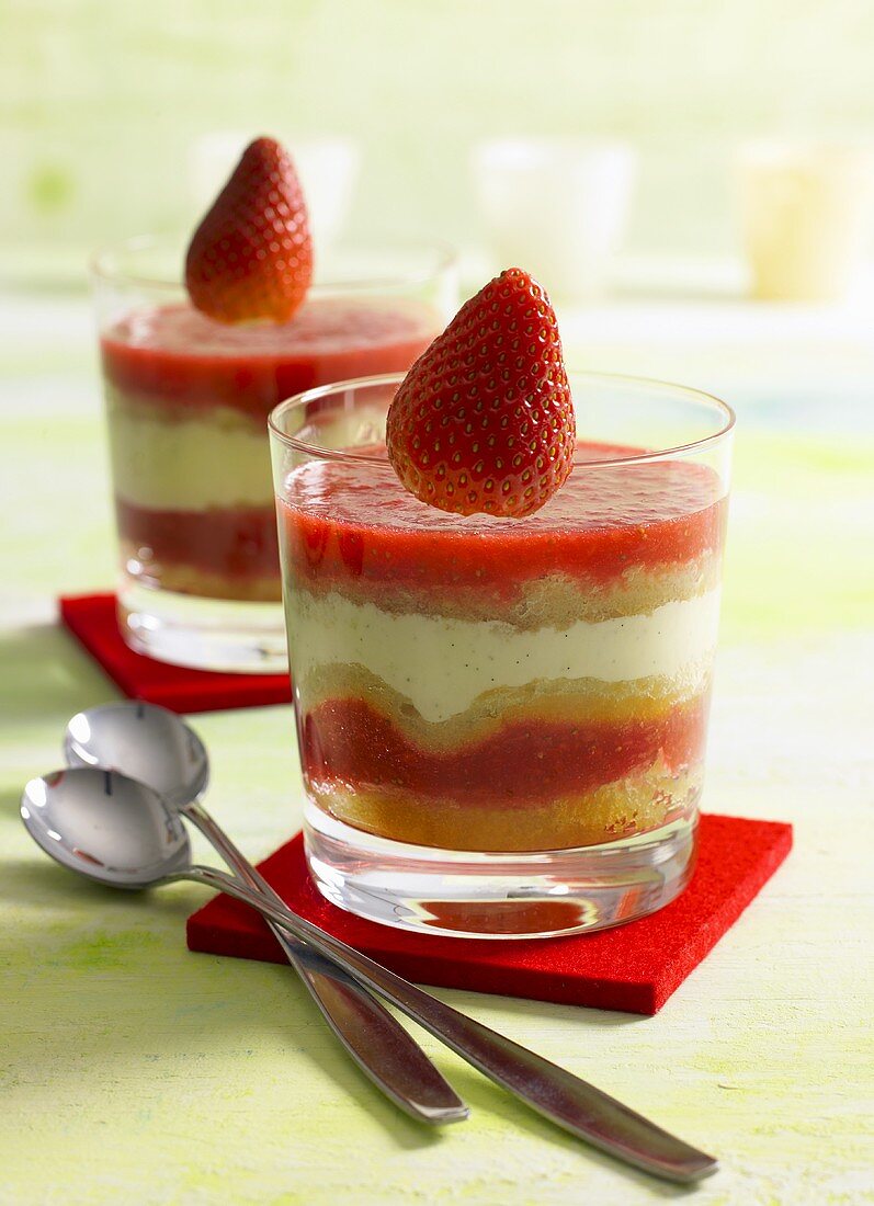 Layered dessert with strawberry jelly