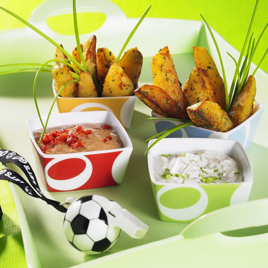Potato wedges with dips and football