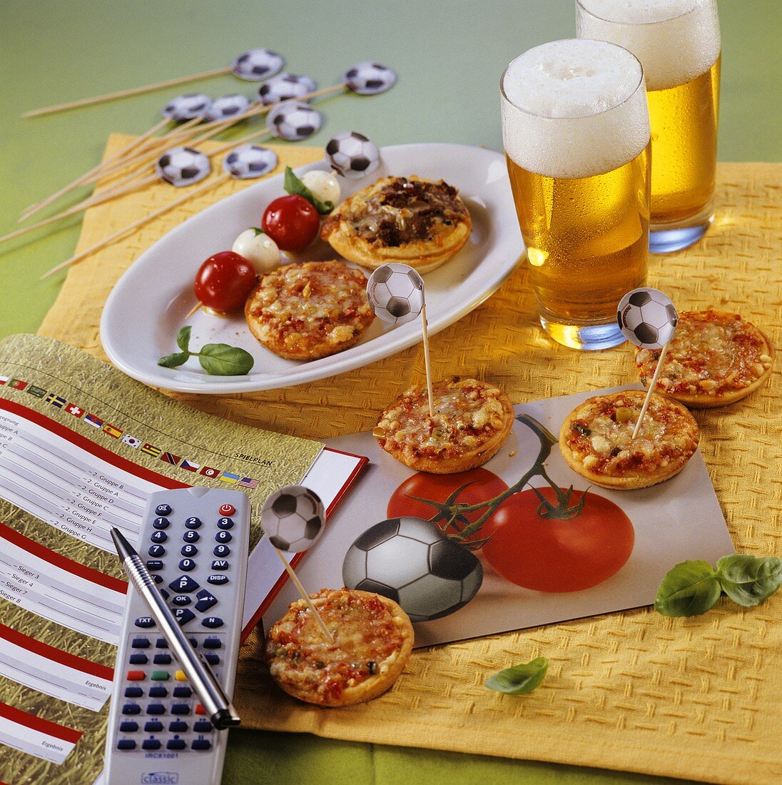 Football themed mini-pizzas, kebabs and remote control