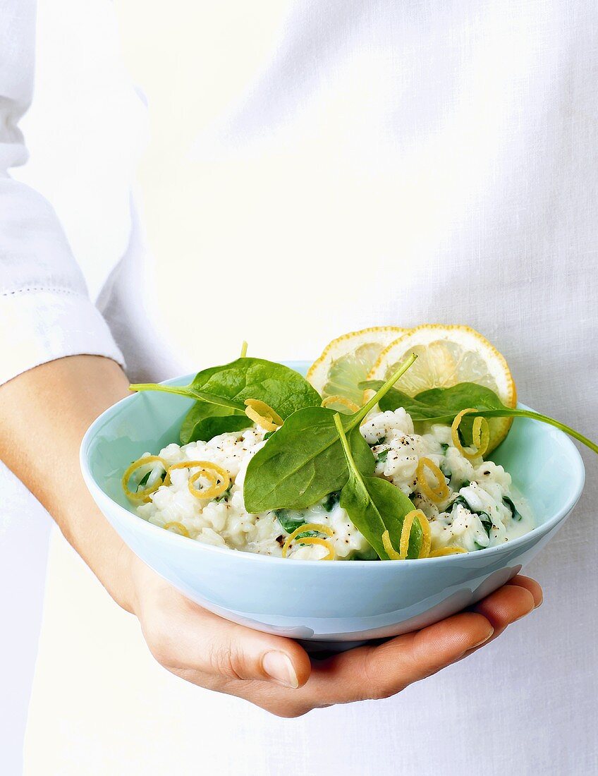 Lemon risotto with fresh goat’s cheese and young spinach