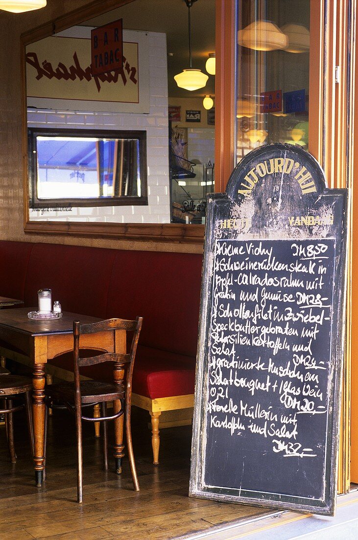 Menu board at the entrance to a bistro