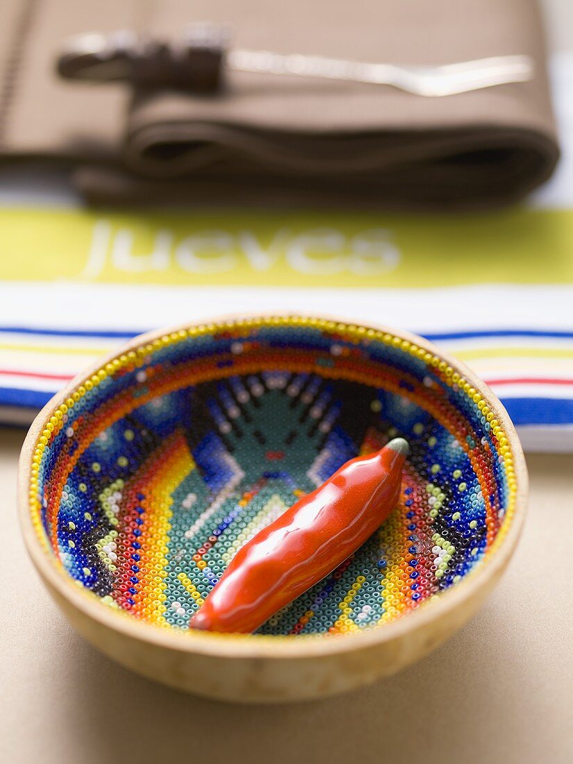 Chilli in coloured bowl (table decoration from Mexico)