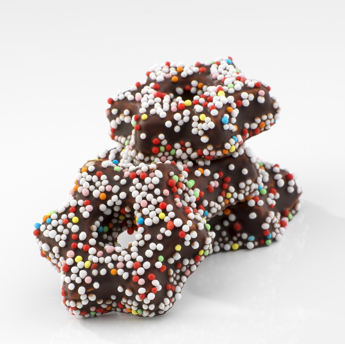 Chocolate stars with coloured sprinkles