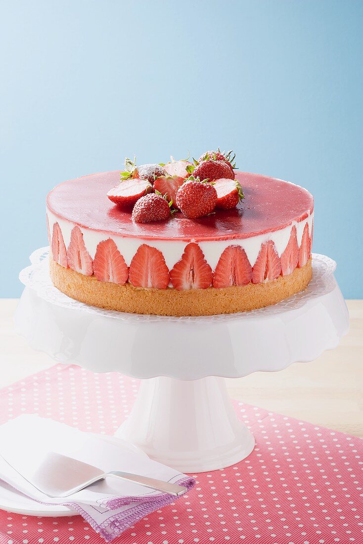 Strawberry yoghurt cake on cake stand