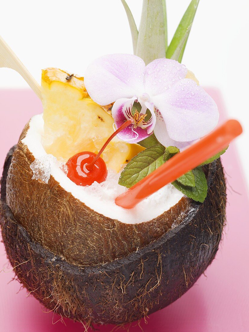 Piña colada in hollowed-out coconut