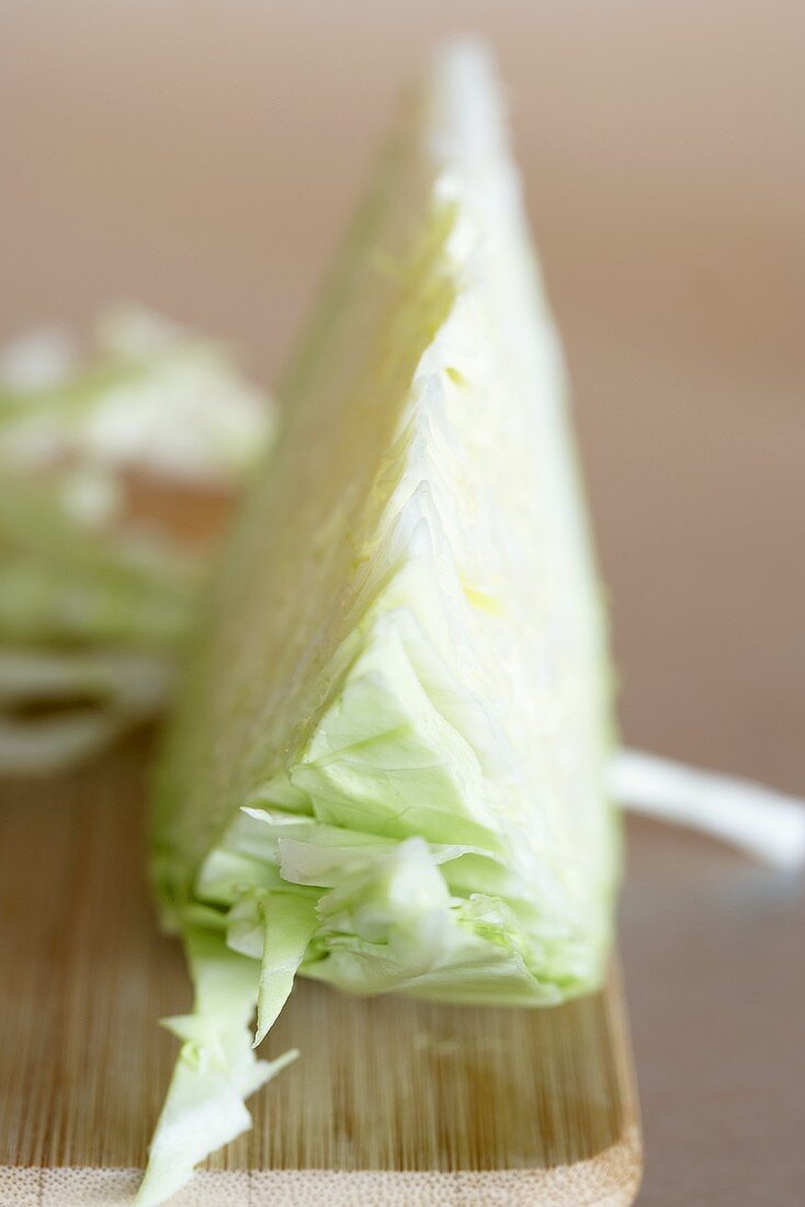 White cabbage on chopping board