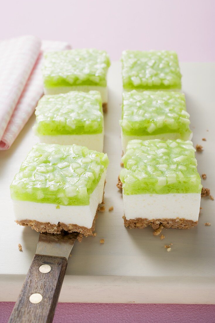 Several pieces of apple yoghurt cheesecake