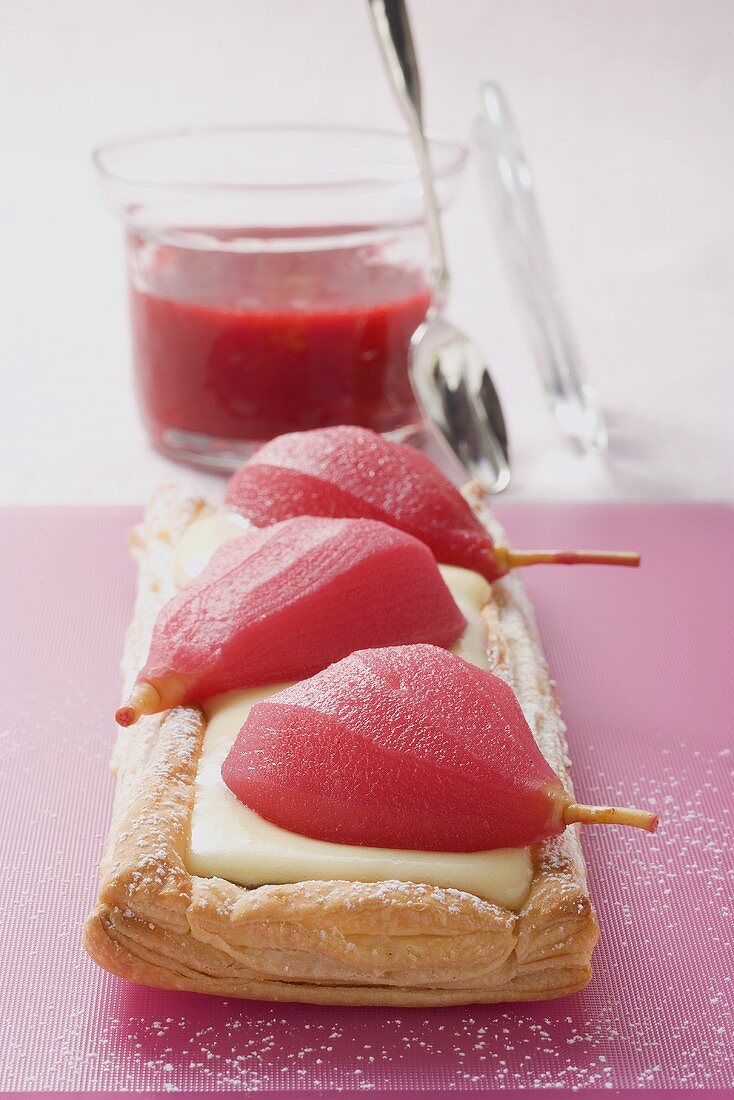 Poached pear puff pastry tart
