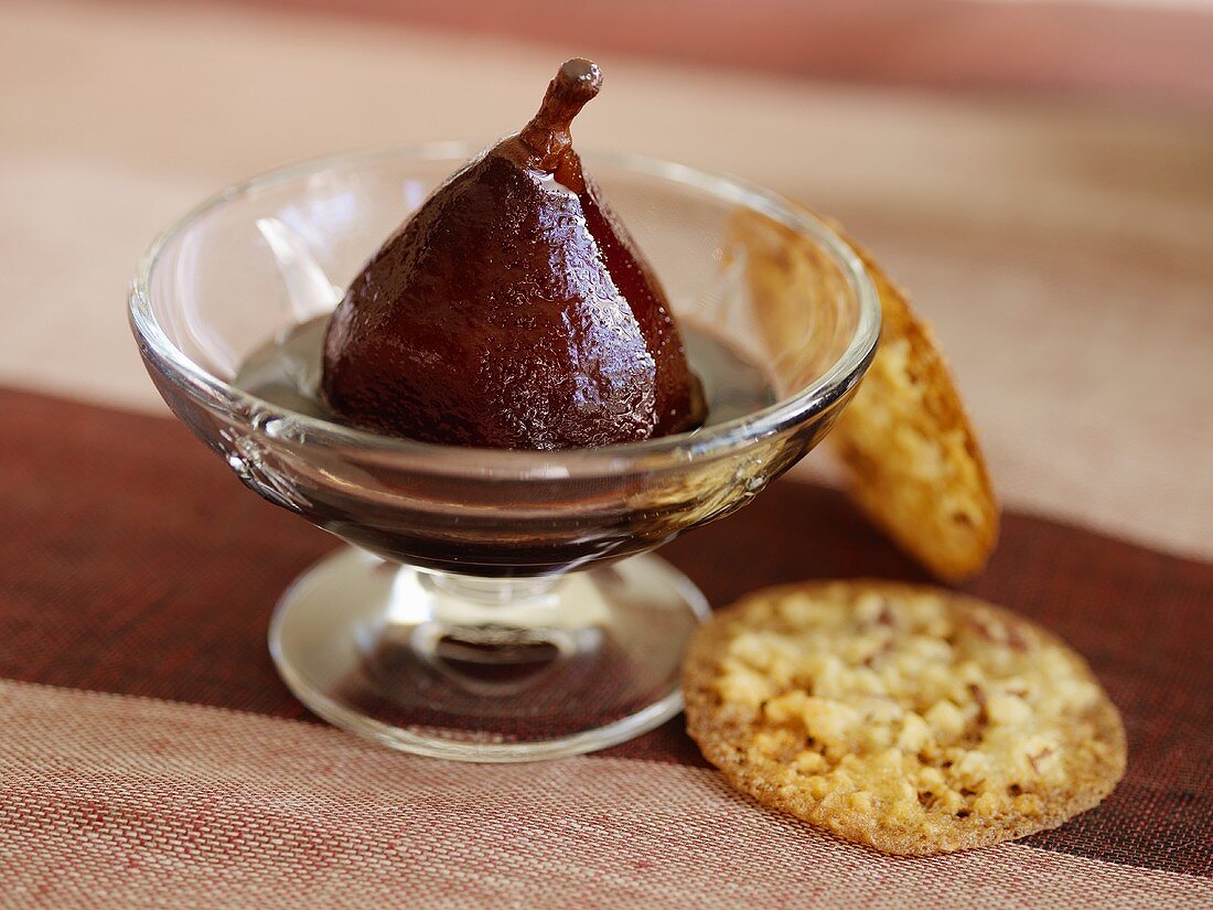 Red wine pear with biscuits