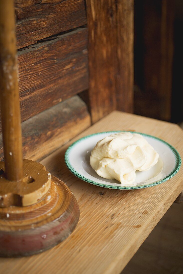 Farmhouse butter on a plate in an Alpine chalet