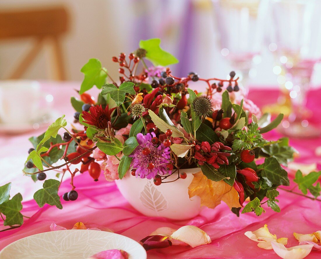 Autumnal arrangement of scabious, Lonicera and berries