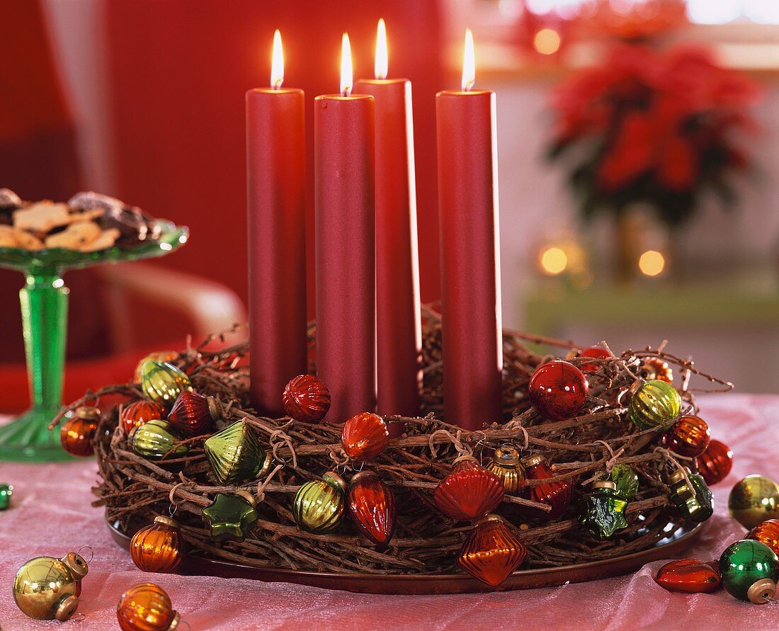Advent wreath of larch twigs with metallic candles & baubles