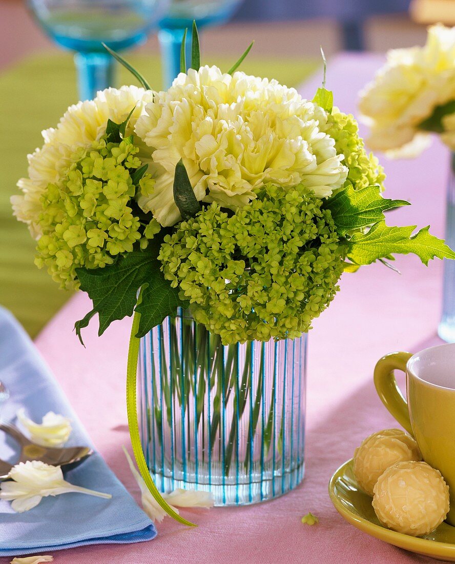 White carnations and Viburnum