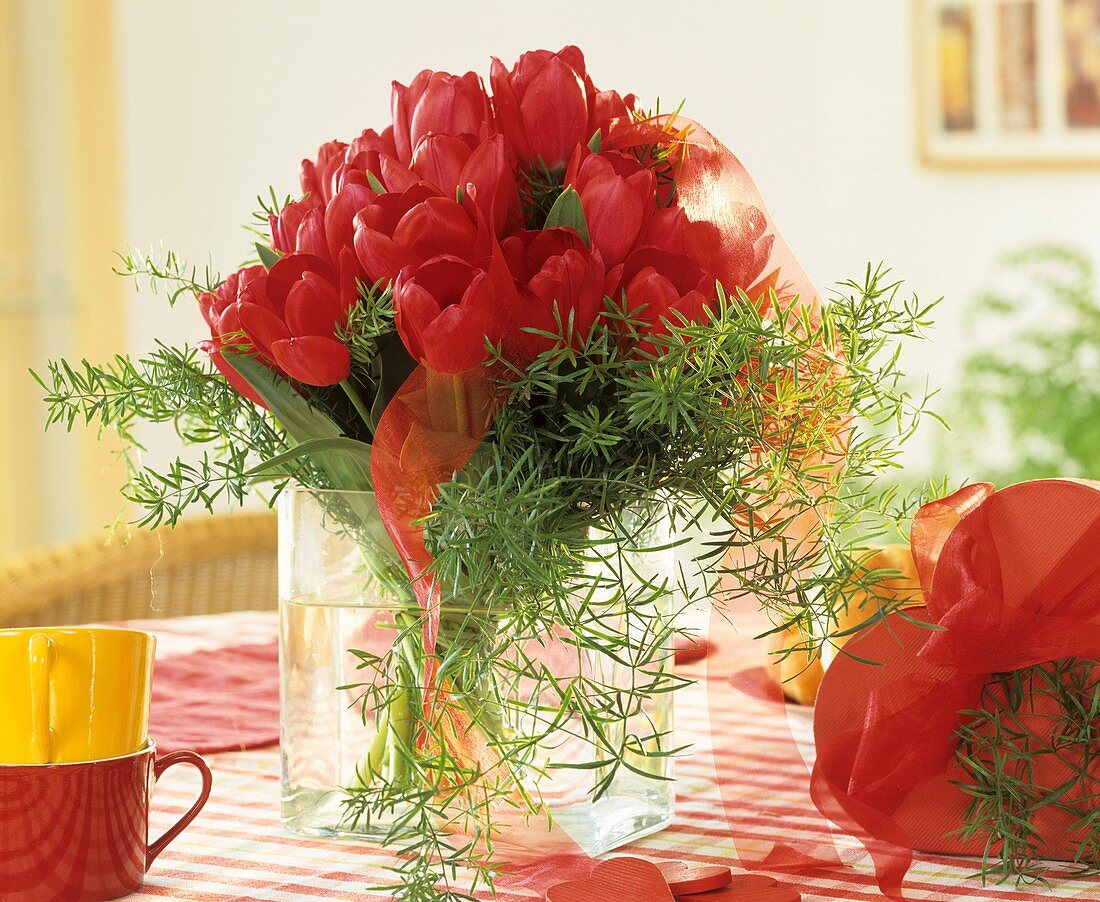 Vase of red tulips