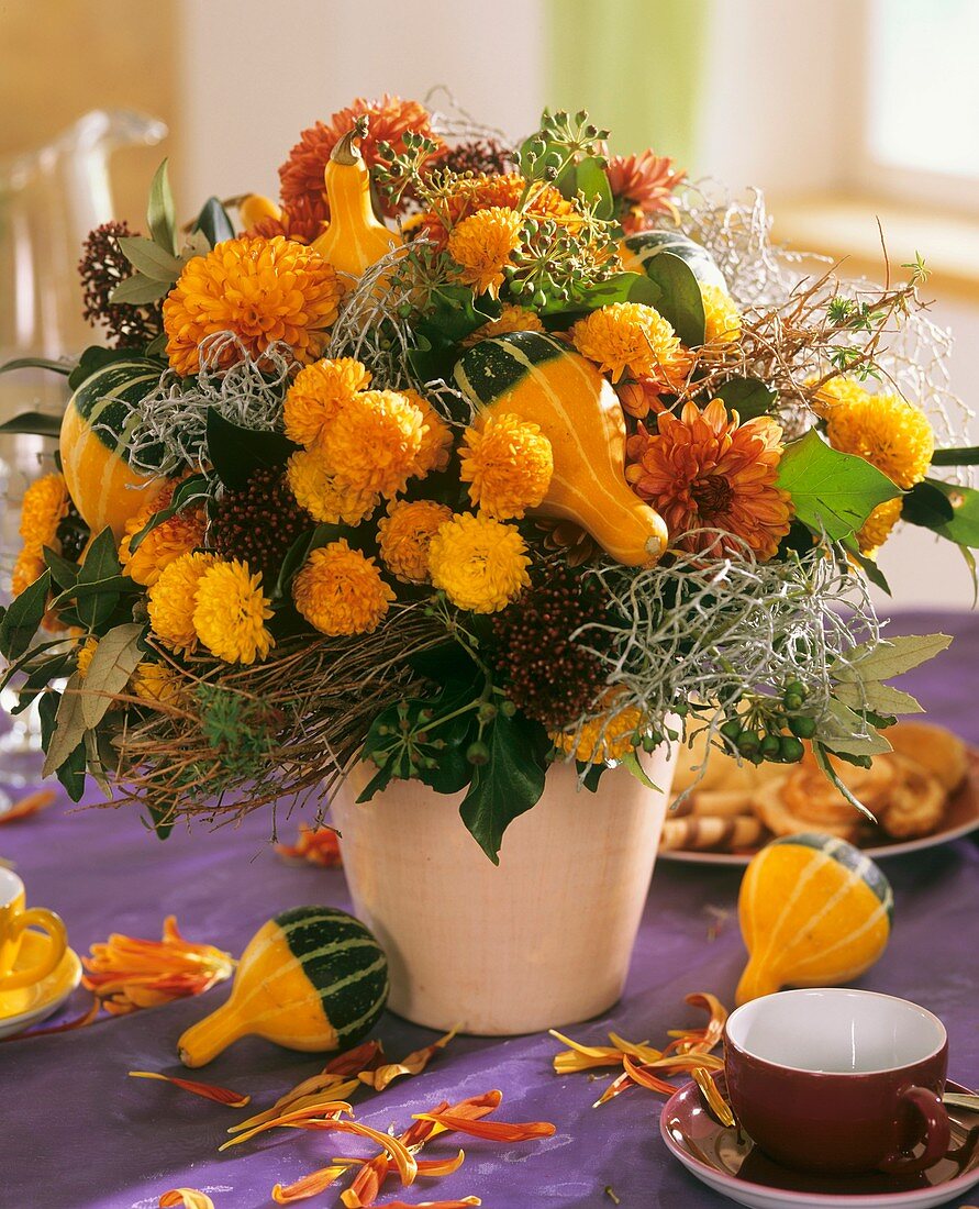 Autumn arrangement of chrysanthemums & ornamental gourds