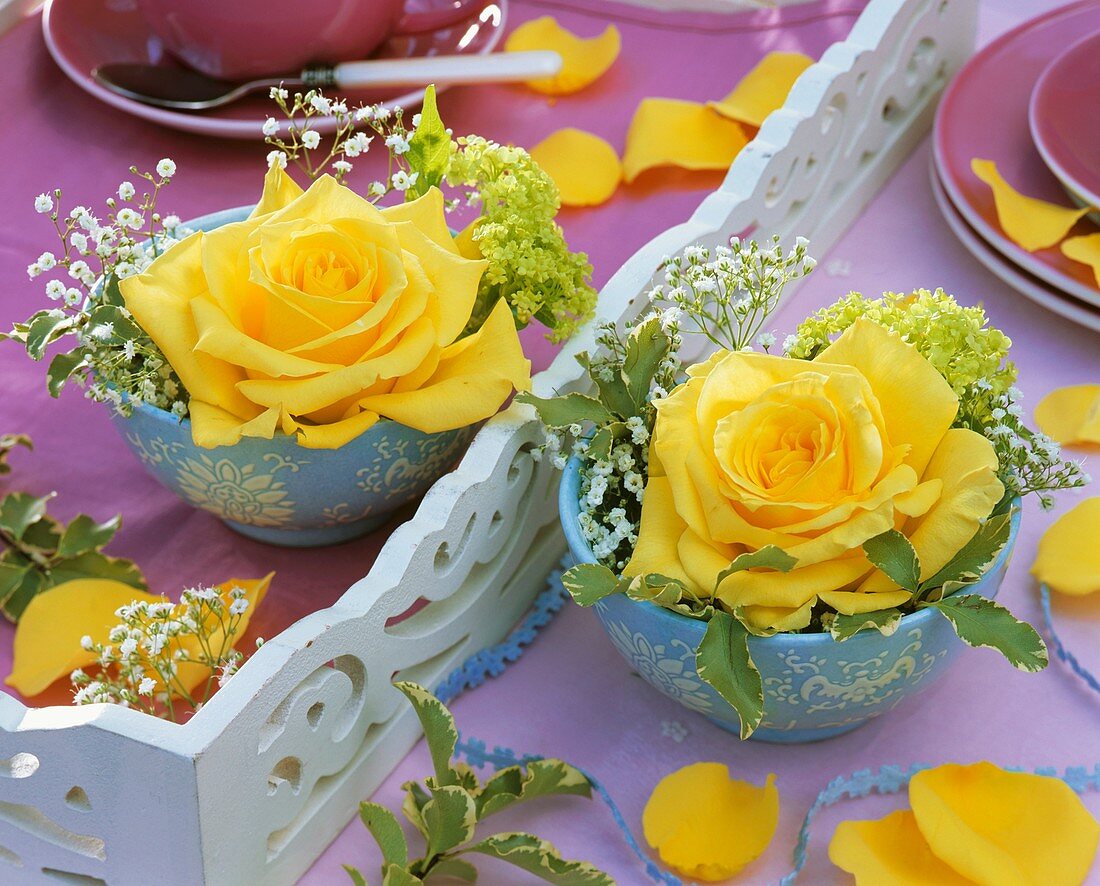 Yellow roses with Gypsophila and Viburnum