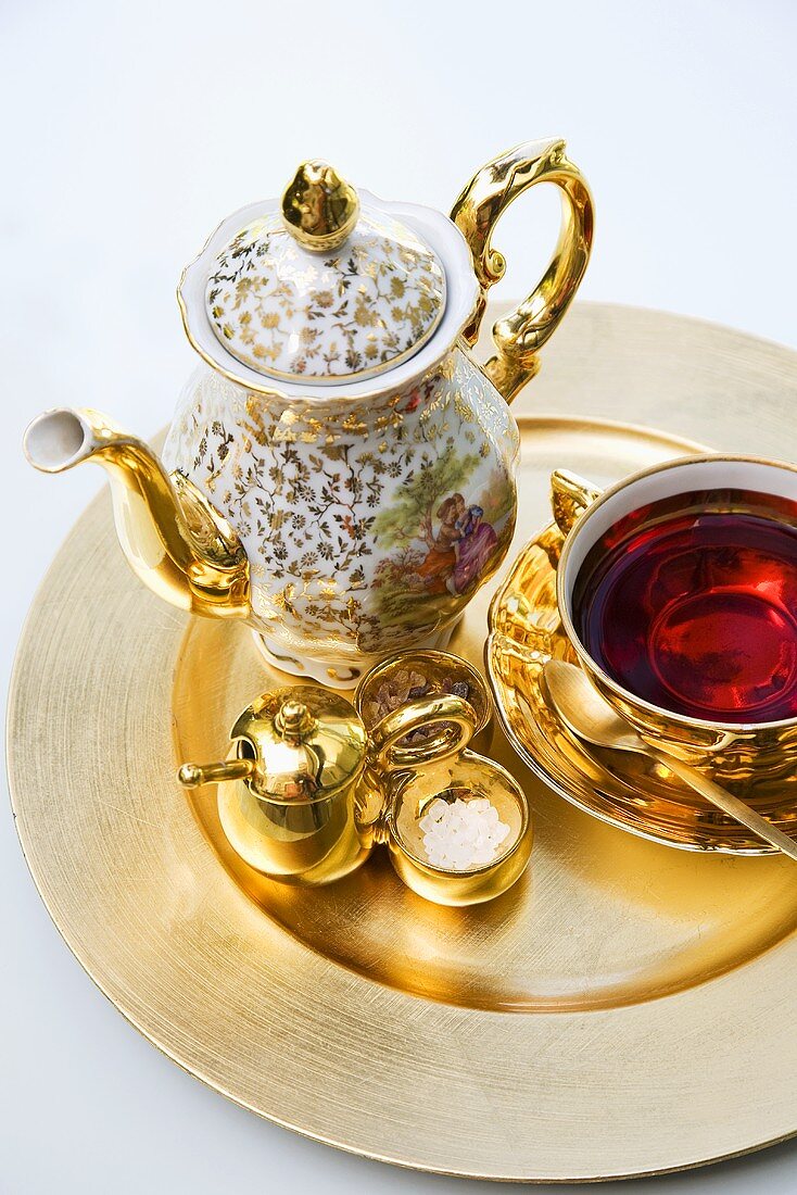 Gold tea set with wild berry tea