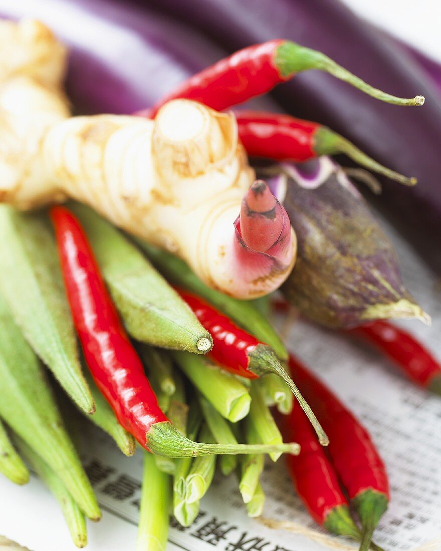 Vegetables and spices on Asian newspaper