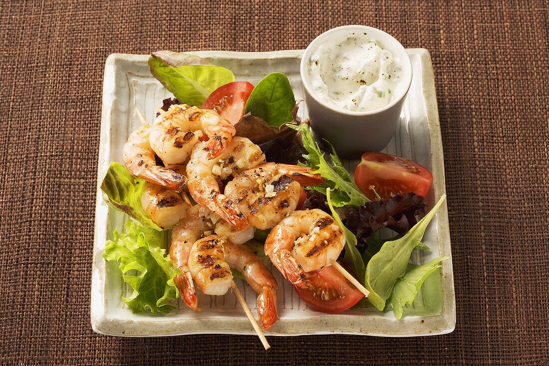 Mixed salad with prawn skewers