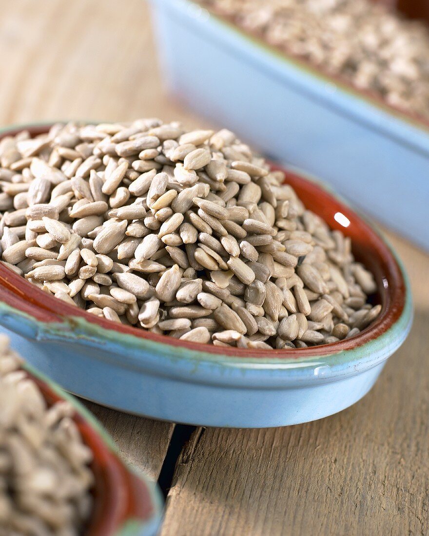 Sunflower seeds in pale blue dish