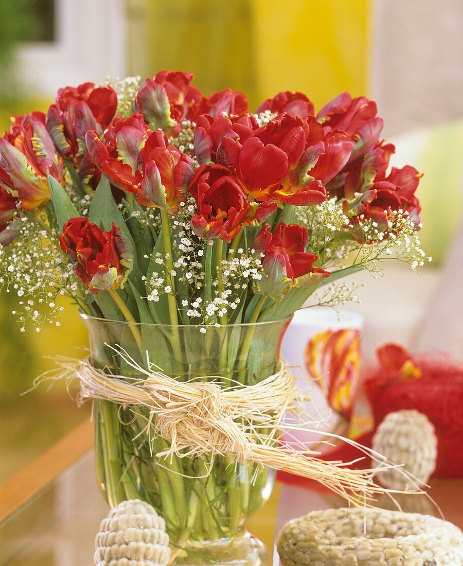 Parrot tulips with gypsophila and Easter decorations