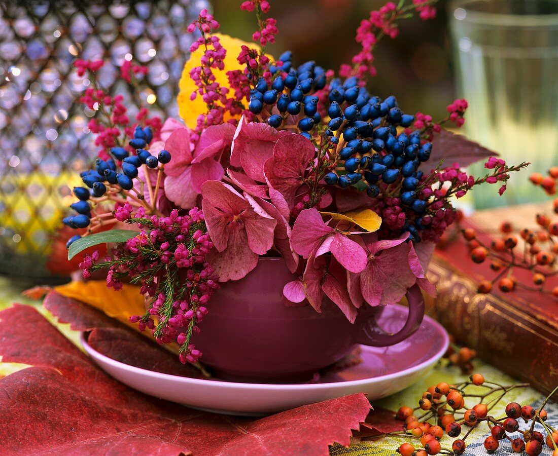 Autumnal arrangement with berries as table decoration