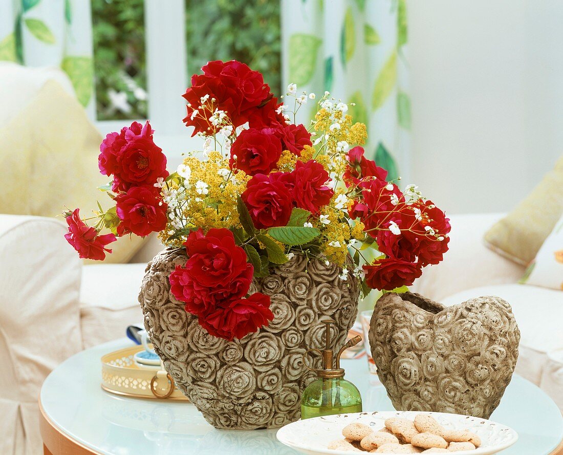 Climbing roses, lady's mantle and gypsophila