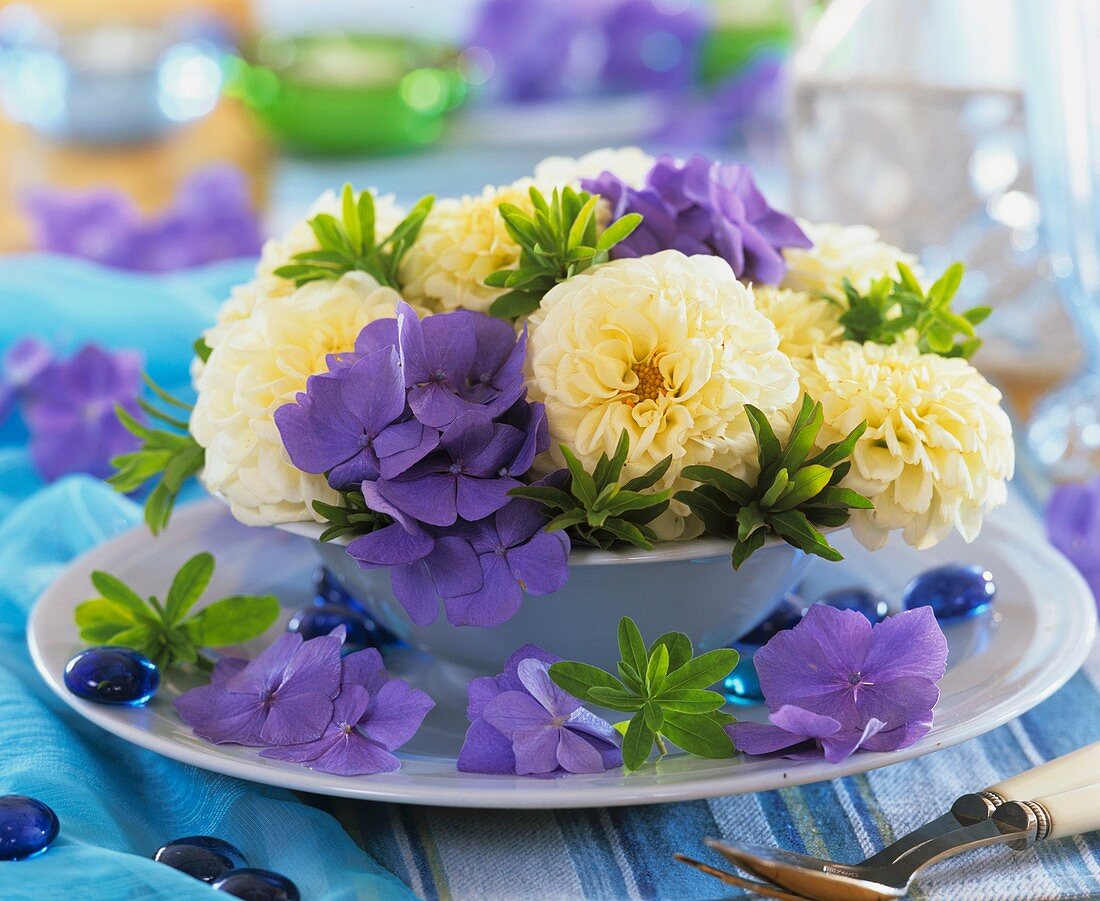 Bowl of dahlias, hydrangeas and Euphorbia