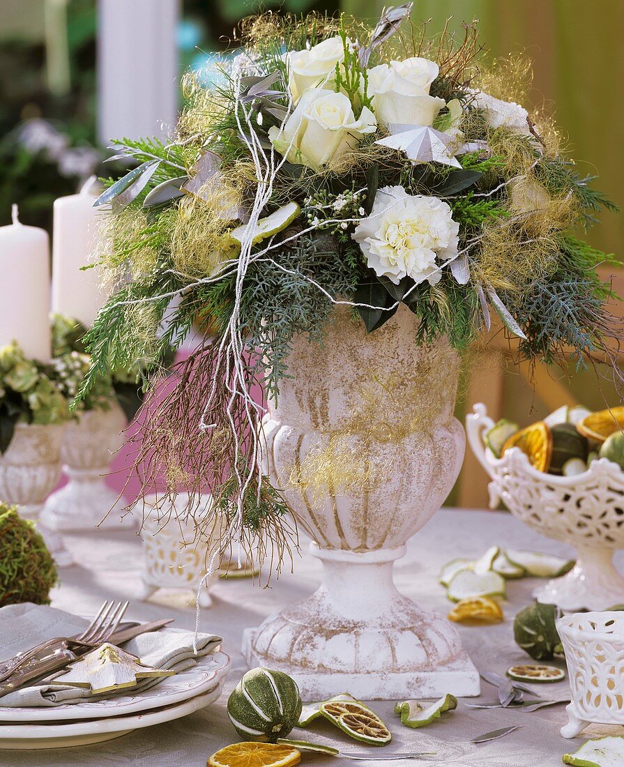 Christmassy arrangement of roses and carnations