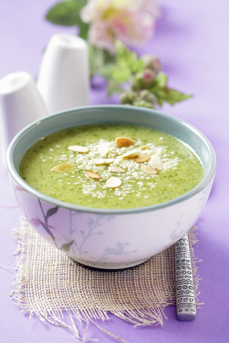 Herb soup with flaked almonds