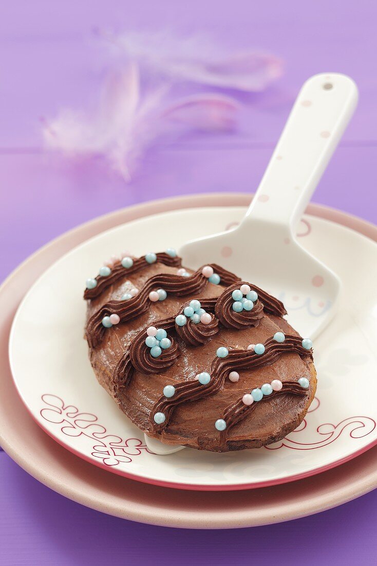 Egg-shaped mazurek with chocolate cream for Easter